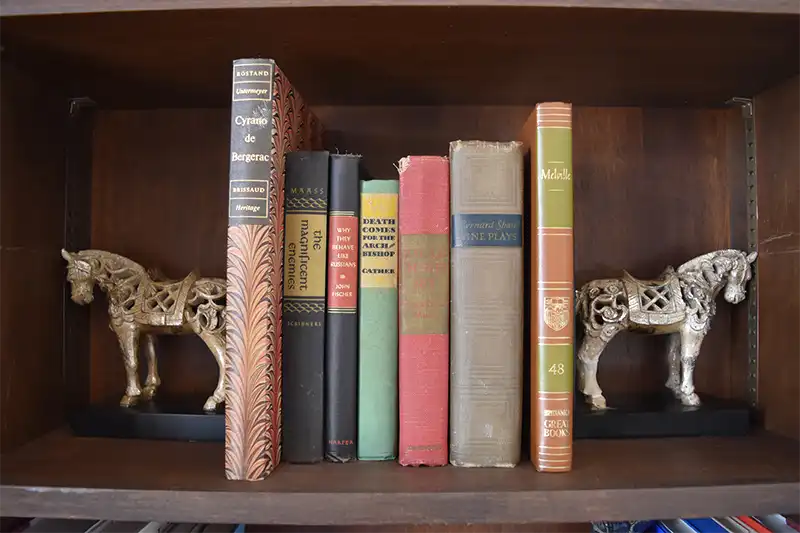 Our Policies 1 Books on a shelf at the Inn at Evergreen